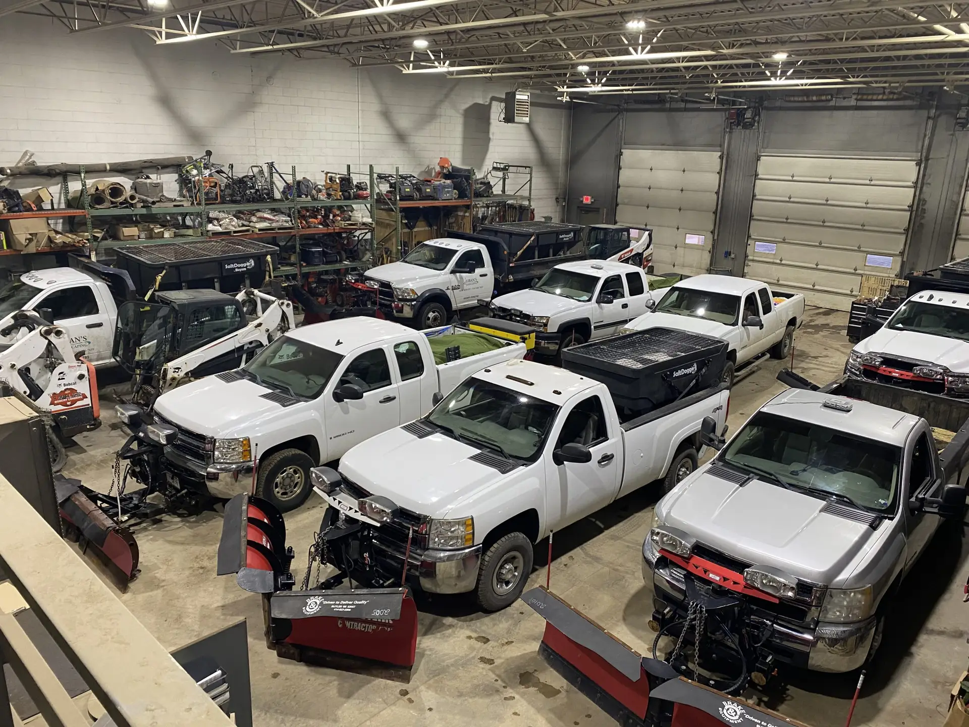 In this photo, you’ll see Liban Landscape’s fleet of trucks stored safely in a warm warehouse, ready to spring into action at a moment's notice. With winter weather on the horizon in Waukesha, WI, our dedicated team ensures that both commercial and residential snow removal services are fully prepared to tackle even the coldest snowstorms. Each truck is equipped with the tools needed to keep your property safe and accessible, showcasing our commitment to reliable service during the harshest winter conditions. When the snow starts to fall, you can count on us to be ready!